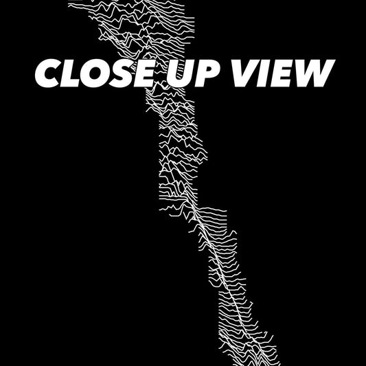 Close-up view of the Capitol Reef National Park poster artwork, showing white topographic elevation lines on black