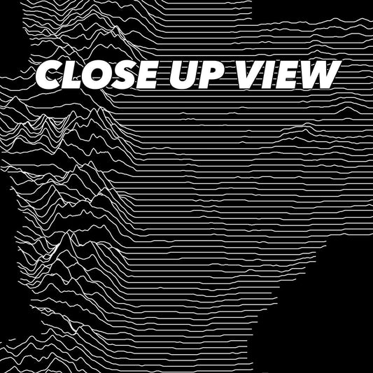 Close-up view of the Grand Teton National Park poster artwork, showing white topographic elevation lines on black