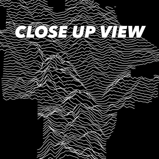 Close-up view of the Pinnacles National Park poster artwork, showing white topographic elevation lines on black