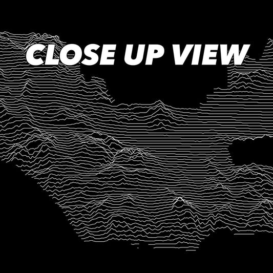 Close-up view of the Joshua Tree National Park poster artwork, showing white topographic elevation lines on black