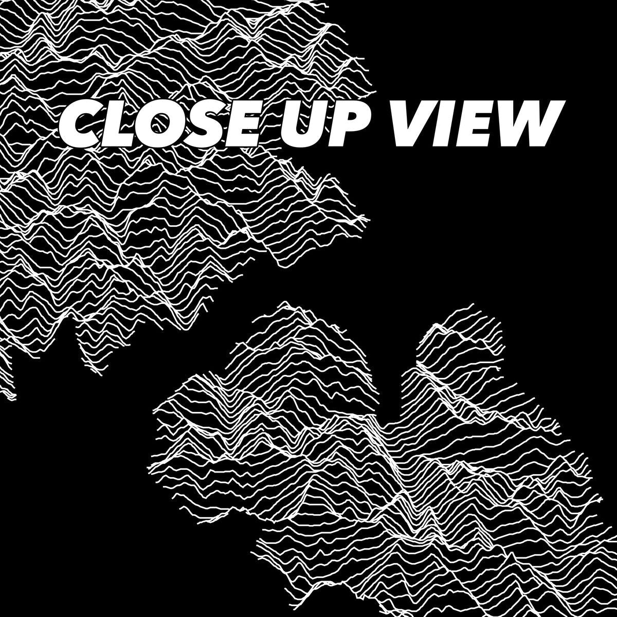 Close-up view of the North Cascades National Park poster artwork, showing white topographic elevation lines on black